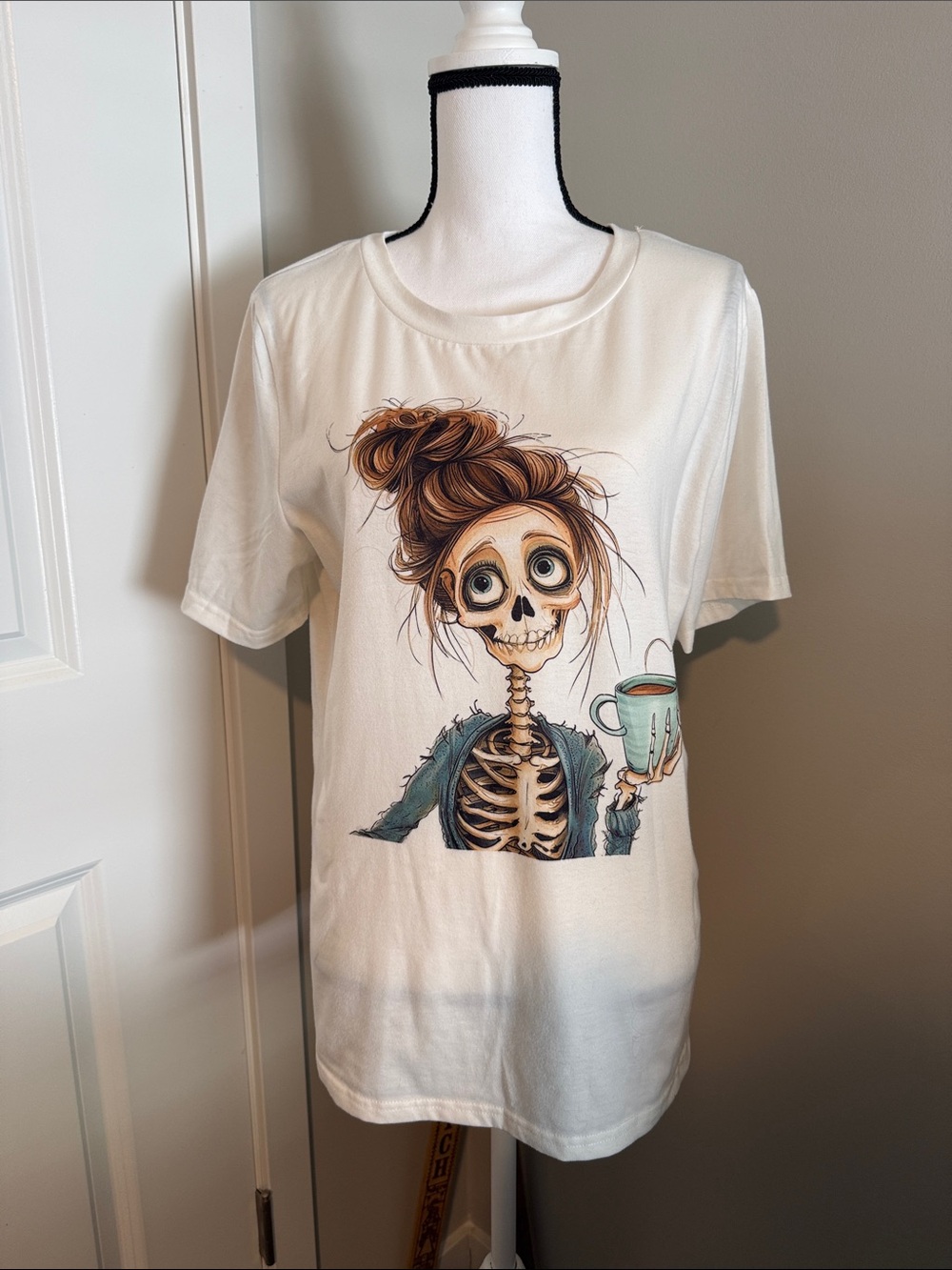 White Graphic Tee with Skeleton Girl and Coffee Illustration
